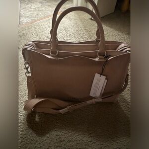 Rebecca Minkoff bag with crossbody strap and dust bag.